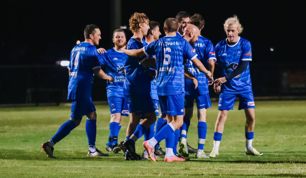 Bathurst 75 players celebrate a goal in their game against Orana Spurs. Picture by James Arrow.