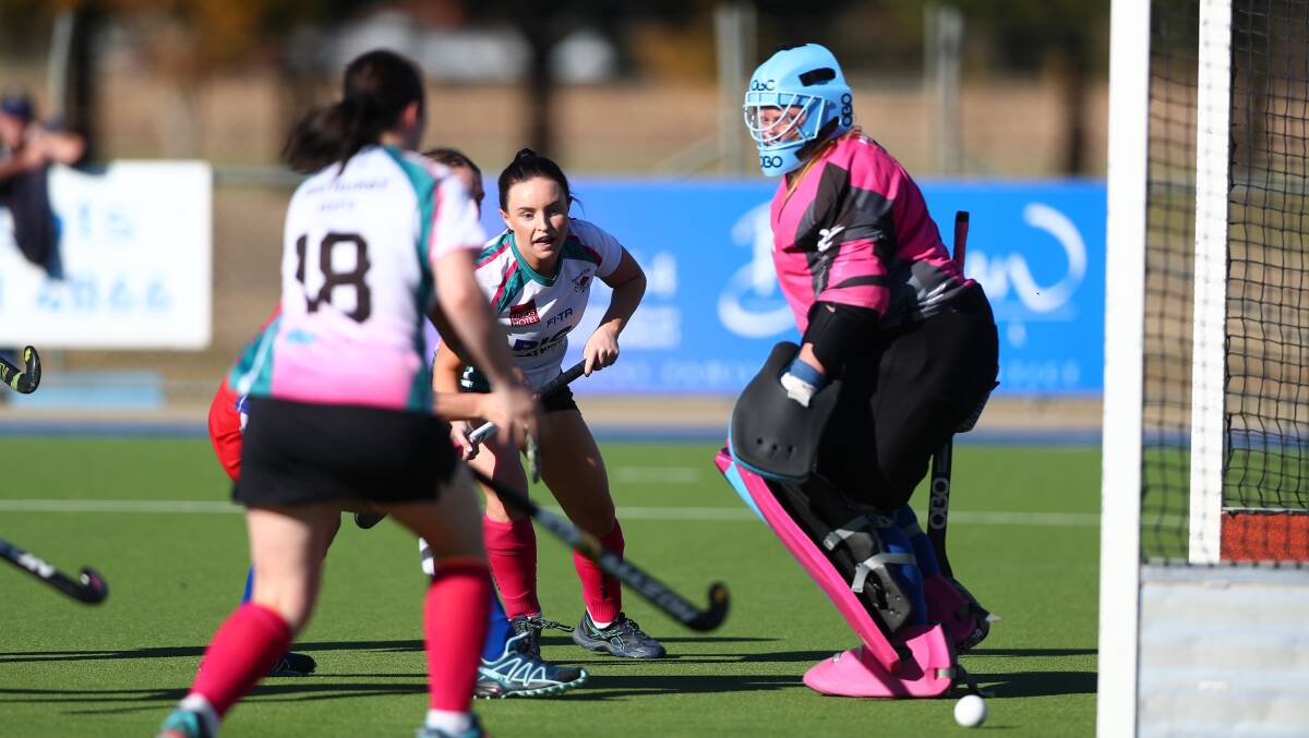 WE'RE NEARLY BACK: Kelsey Willott (centre) and Bathurst City will get their training for the Premier League Hockey season underway this Wednesday. Photo: PHIL BLATCH