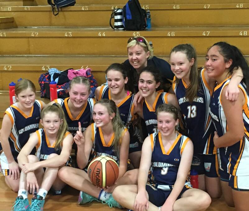WE'RE NUMBER ONE: The Bathurst Goldminers' under 14s girls division two side are all smiles after their thrilling Country Tournament triumph. Photo: CONTRIBUTED