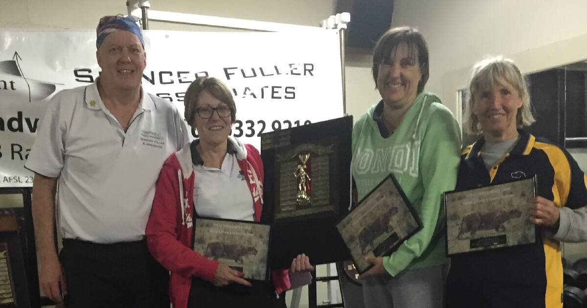 CENTRAL WEST TEST: Dave Fuller with last year's Panthers Bathurst ladies division two-winning team at the AMP Intertown Squash Competition. Bathurst will field four men's teams and one women's team this year.
