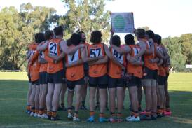 Giants in a huddle during the opening round match in Dubbo. Picture by Lachlan Munns.