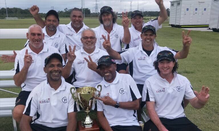 TROPHY TIME: The Kamilaroi Kricketers, featuring Bathurst's Percy Raveneau, celebrate their title. Photo: CONTRIBUTED