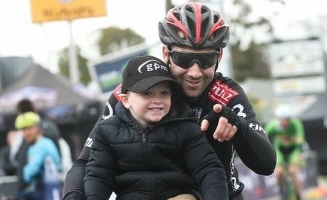 THAT'S A WRAP: Craig Hutton with son Hugh following the Tour of Gippsland's final stage.