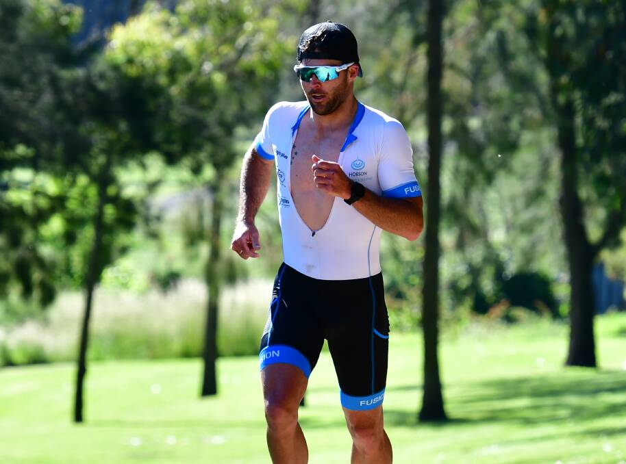 NEARLY HOME: Nick North begins his second loop of the run leg in Sunday's opening Bathurst Wallabies Triathlon round. Photo: ALEXANDER GRANT