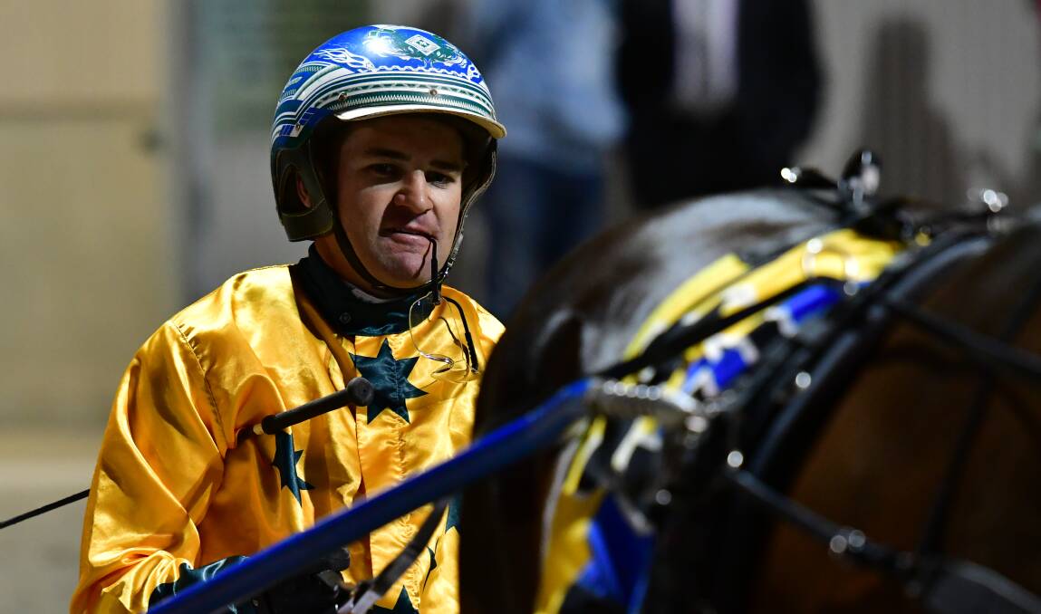 INSIDE DRAW: Luke McCarthy has the drive on Craig Cross' gelding Bomb Suit during this Saturday night's Gold Crown heats. Photo: ALEXANDER GRANT