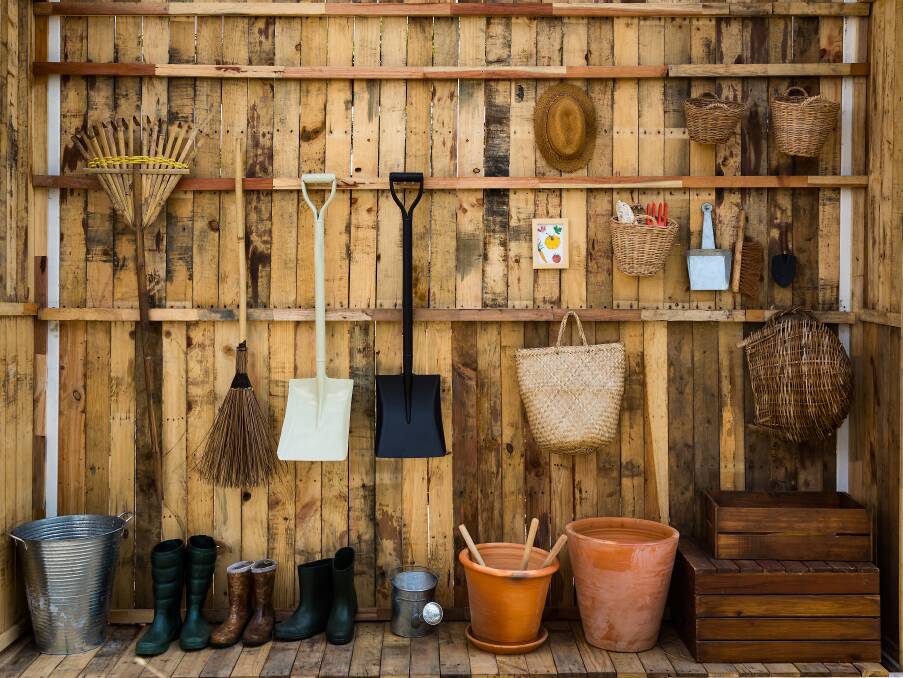 NEAT: Use any empty space to secure hooks to hang items. Photo: Shutterstock