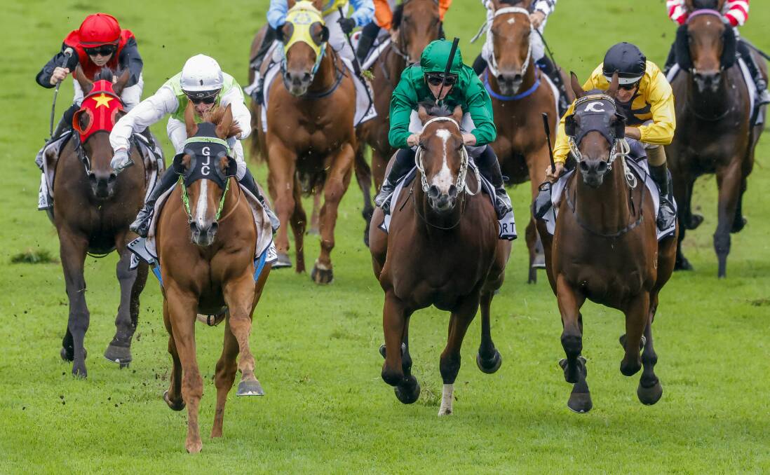 ALMOST: Hugh Bowman and Amulet Street (right) finished third behind Wagga star Another One (left, white cap). Picture: Jenny Evans/Getty Images