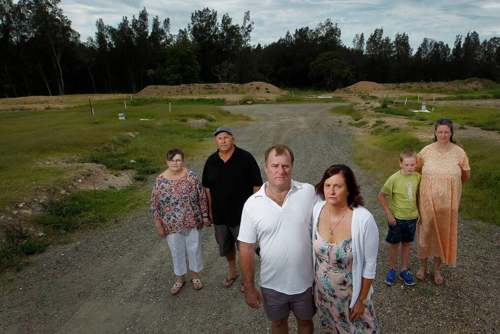 BUYERS: From left, Margaret Morgan-King and Stephen King, Grant and Kim Conroy and Tim and Melissa Weatherstone at the Teralba Waters Estate site. Picture: Marina Neil