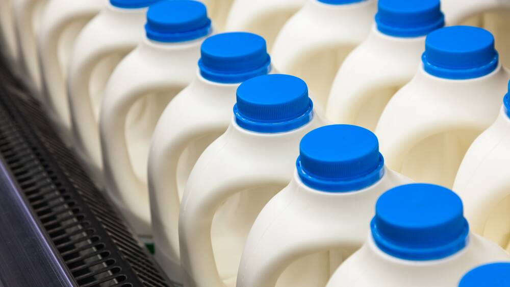 Coles increases milk prices, says benefit will go to farmers