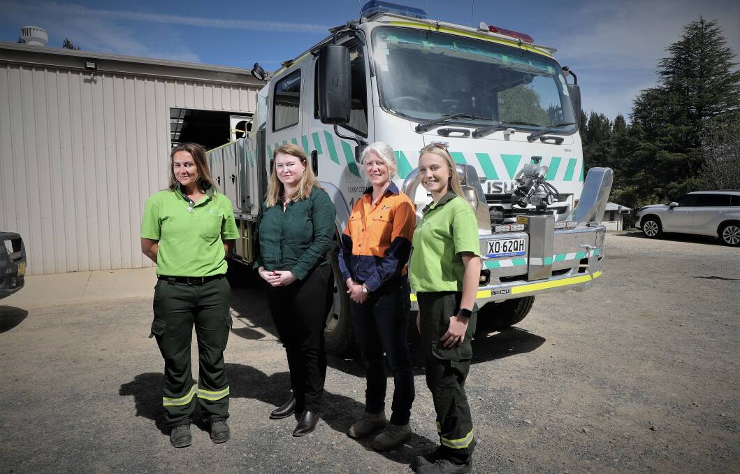 Firefighter Ruth Williams, Minister for Regional NSW Tara Moriarty, Claire Kirby from the Forestry Corporation and firefighter Izzy Smith with the new tanker at the Forestry Corporation's Sunny Corner depot. Picture by Phil Blatch