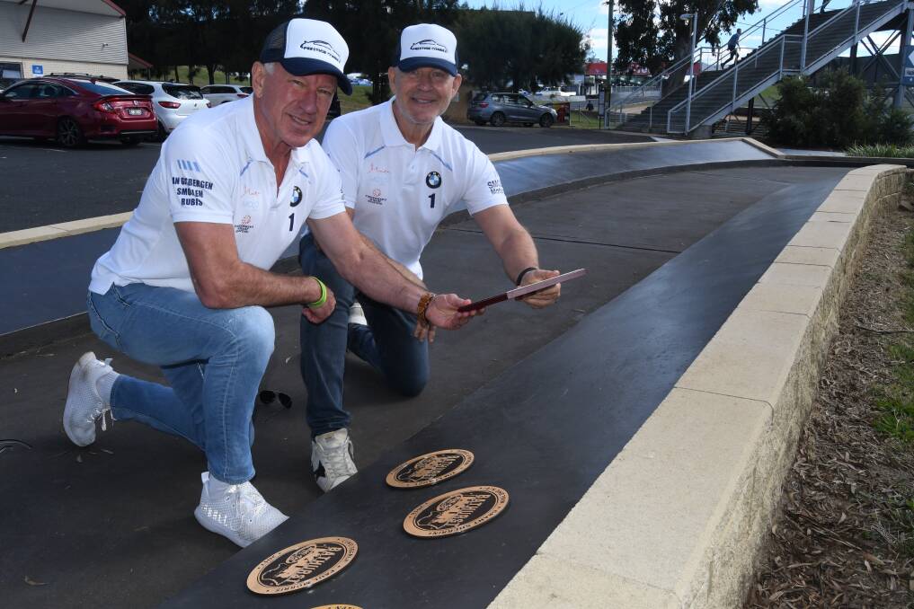 A PLACE IN HISTORY: Winners of the 2021 Bathurst 6 Hour, Rob Rubis and Shane Smollen, with their plaque on the new victor's walk outside the National Motor Racing Museum. 