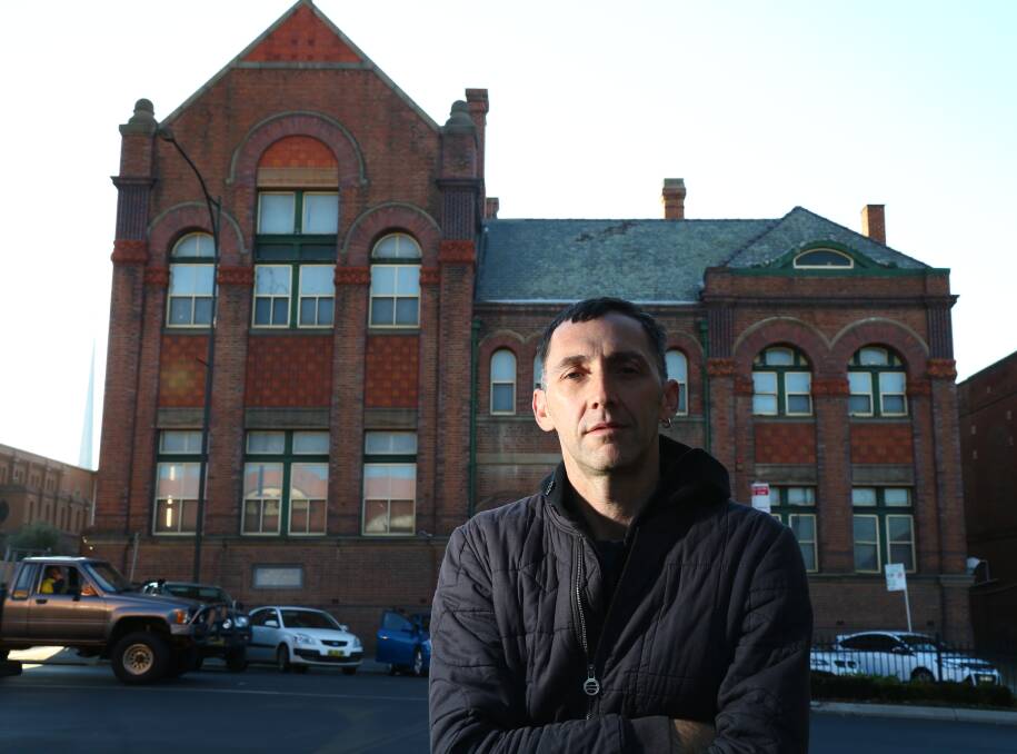 CREATIVE MIND: ESEM Projects director Michael Killalea, pictured at the old TAFE building, one of the places that has previously been illuminated. Photo: PHIL BLATCH 070315pbtafe5