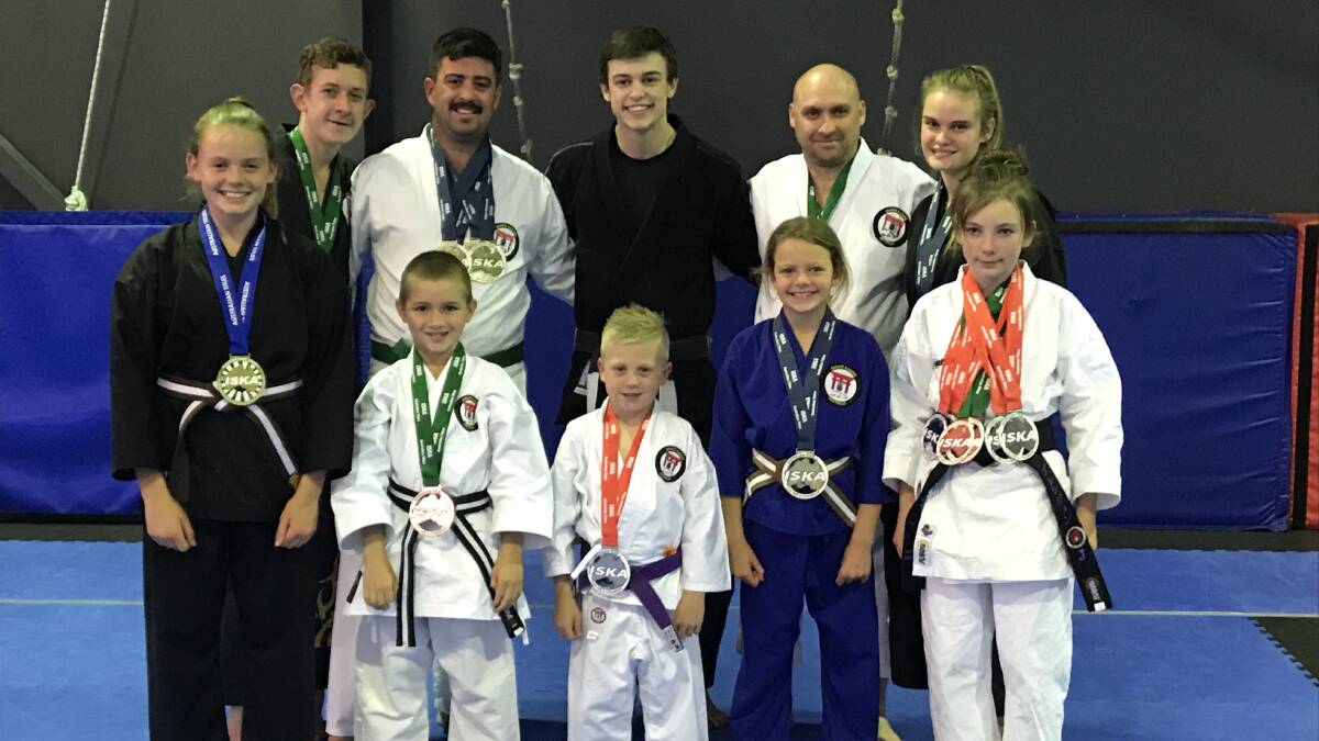 CHAMPIONS: The Hickey Martial Arts Tournament team return to Bathurst with many medals at the Nationals. Photo: ISKA NATIONAL TEAM