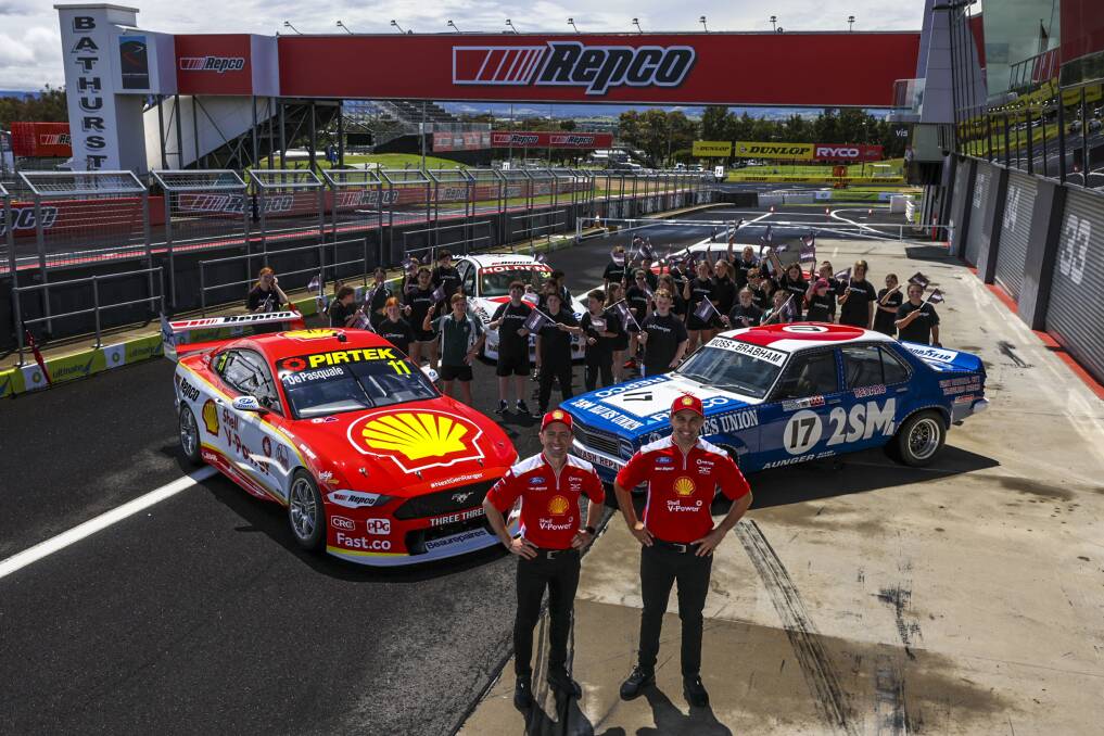 TEAMING UP: Dick Johnson Racing's Tony D'Alberto and Anton de Pasquale with Bathurst children at Mount Panorama. Photo: EDGE Photographics