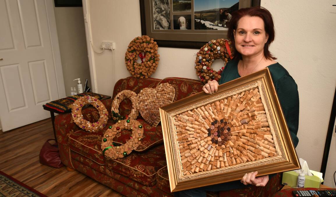 CORK CREATIVITY: Cork artist, Oriana Zanon, with samples of the items she makes and sells through Grapes of Wreath. Photo: CHRIS SEABROOK 070620corker