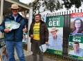 Incumbent Andrew Gee alongside one of his campaign volunteers outside the Kelso Public School polling centre. Photo: RACHEL CHAMBERLAIN
