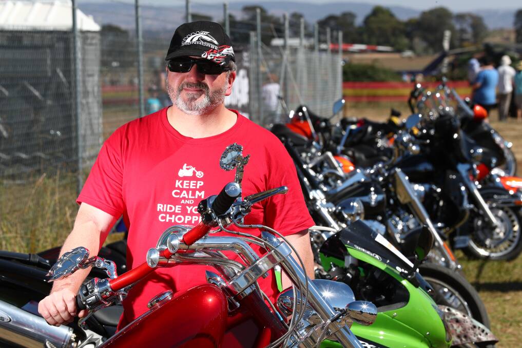 PRIZED POSSESSION: Bill Rollo with his beloved American Ironhorse Texas Chopper, which he had on display at Soar, Ride and Shine. Photo: PHIL BLATCH 040818pbsoar20