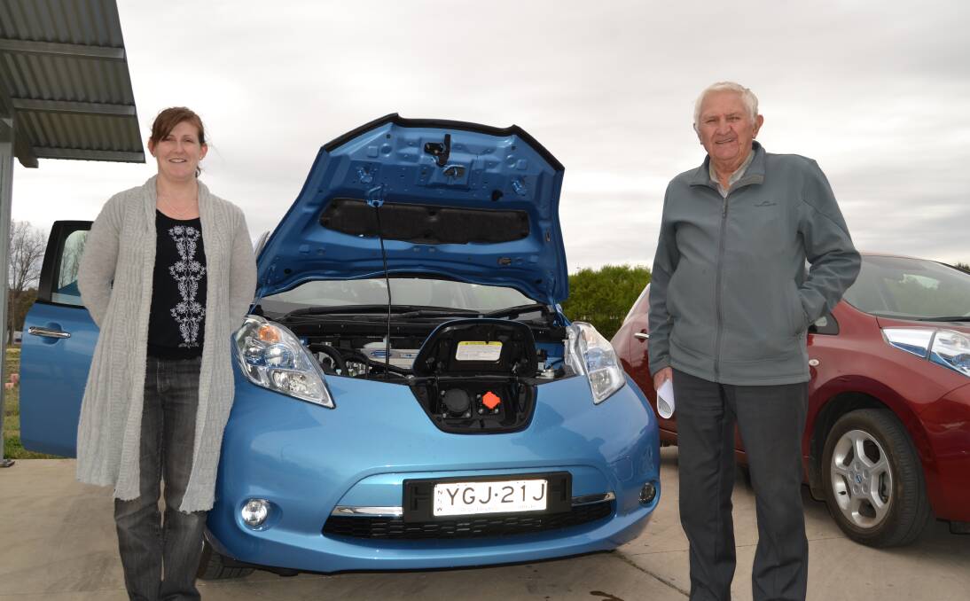 ELECTRIC GOAL: Nissan Leaf owners Jenna-Lee Hurst, of Kelso, and Lindsay Cox, of Eglinton, both use solar panels to charge their vehicle. 100617leaf