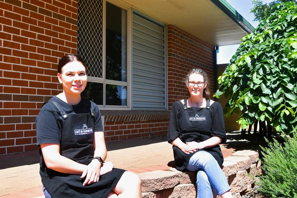 EXCITING PROJECT: Café on Corporation manager Caitlin Symes and volunteer Carol Smith outside the Generosity Church training room, where the window is set to be replaced by an accessible door. Photo: RACHEL CHAMBERLAIN