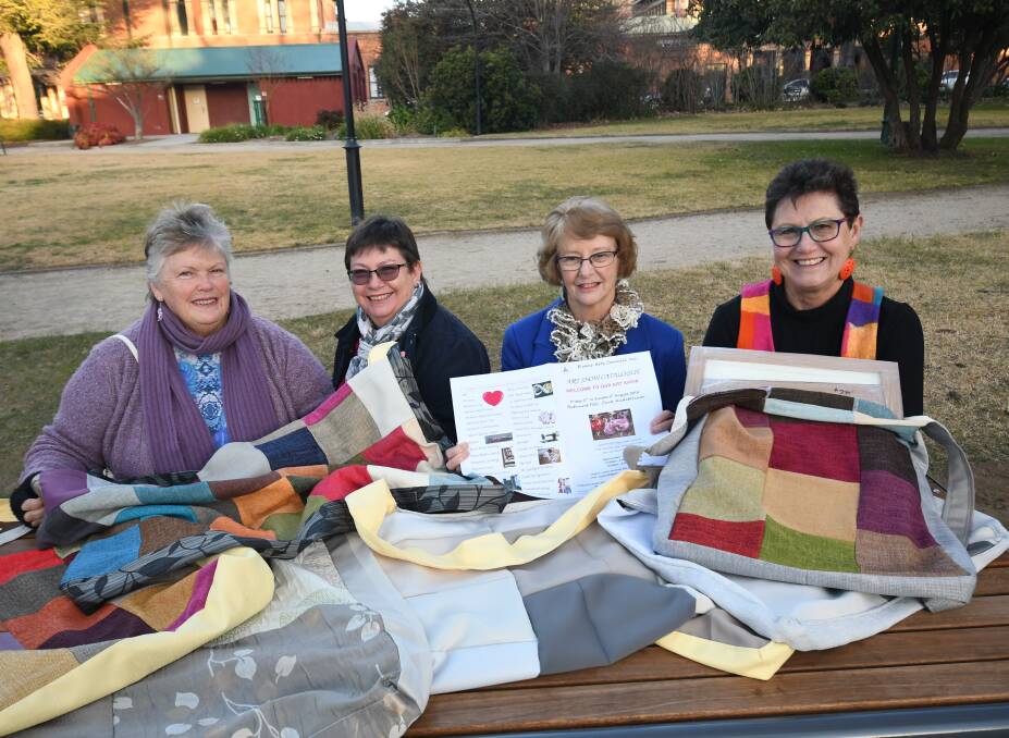 TEAM: Evans Arts Council president Wendy-Lou Tisdell, assistant treasurer Ruth Heaton, secretary Shirley Walsh and media officer Carol Dobson with hand-made carry bags.