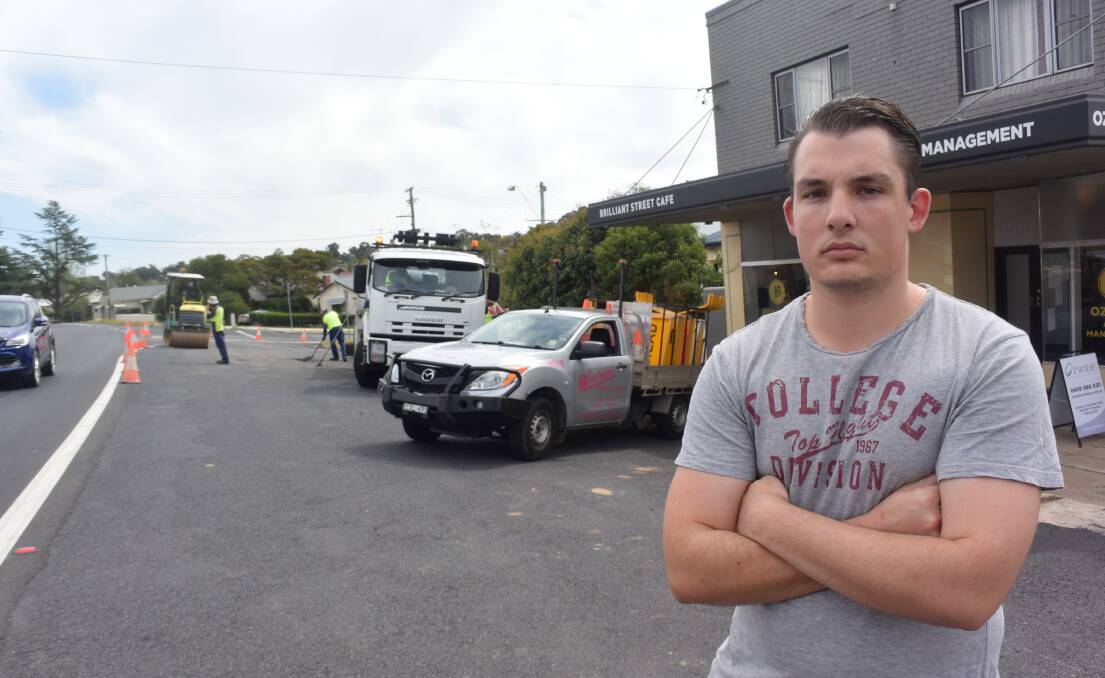NOT HAPPY: Manager of the Brilliant Street cafe, Ben Berger, wasn't pleased to see a large amount of parking space lost outside his business on Friday. Photo: RACHEL CHAMBERLAIN