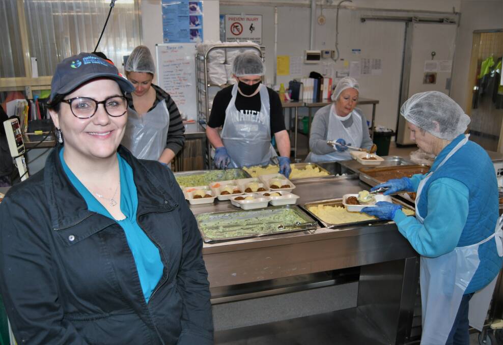 Sarah Thomas, manager of Bathurst Meals on Wheels, in the kitchen with volunteers. Picture by Chris Seabrook 