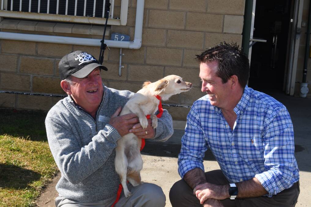 GOOD NEWS: Mayor Bobby Bourke and member for Bathurst Paul Toole with one of the dogs currently staying at the Bathurst Small Animal Pound. Photo: RACHEL CHAMBERLAIN