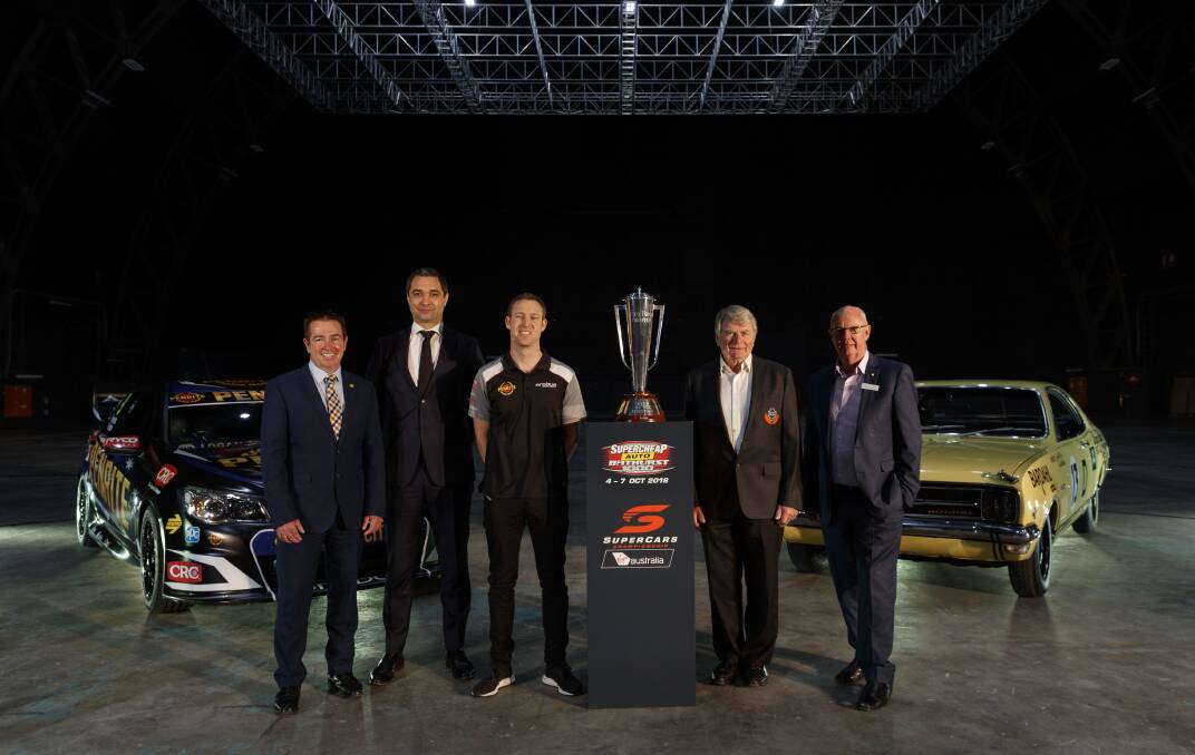 EXCITED: Paul Toole, Sean Seamer, David Reynolds, Colin Bond and Graeme Hanger with the Peter Brock Trophy at the launch of the Great Race on Thursday. Photo: SUPERCARS