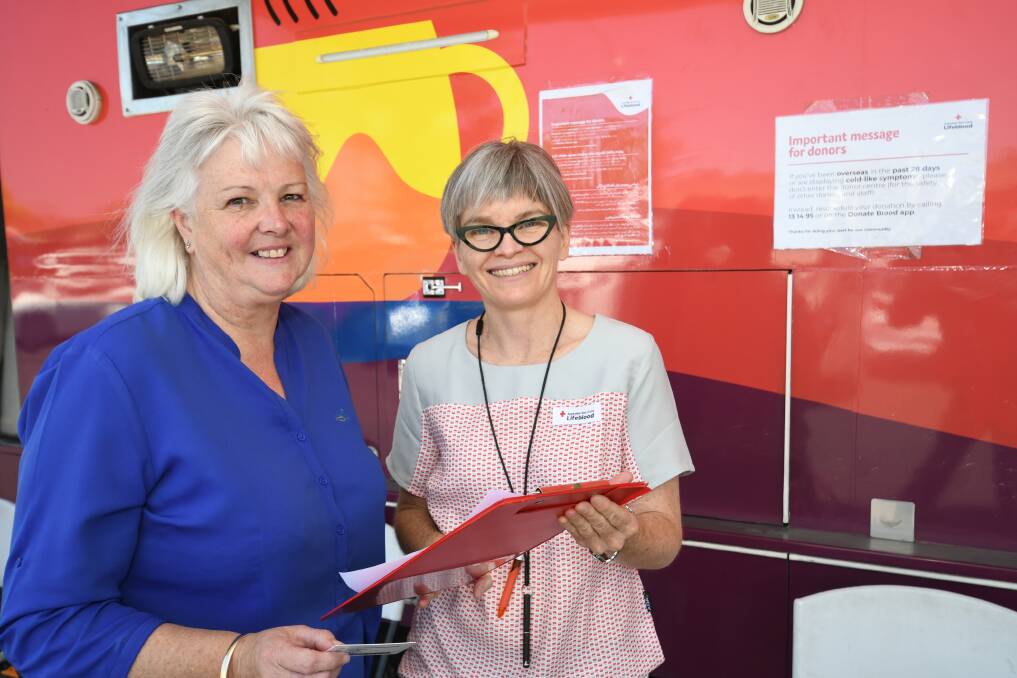 GIVING BLOOD: Donor Susan McPhee with registered nurse Therese Goodacre at the mobile donor centre on Tuesday. Photo: CHRIS SEABROOK 111720cbloodbk