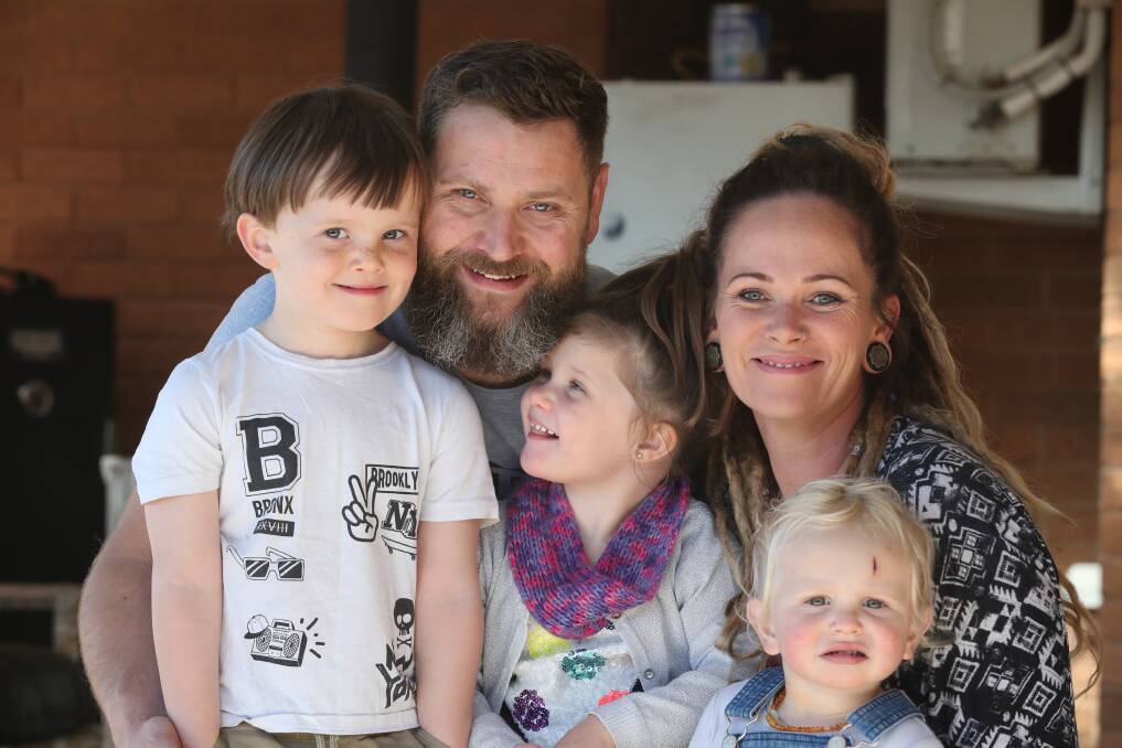  GOOD CAUSE: Four-year-old Poppy Stanton with her parents, Michael and Courtney, and her two brothers Paddy and Buddy. Photo: PHIL BLATCH 081719pbrett8