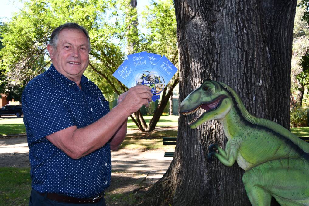 PROMOTION: Peter Rogers with his new brochures and Dennis the Dinosaur, both of which are being used to promote Bathurst. 