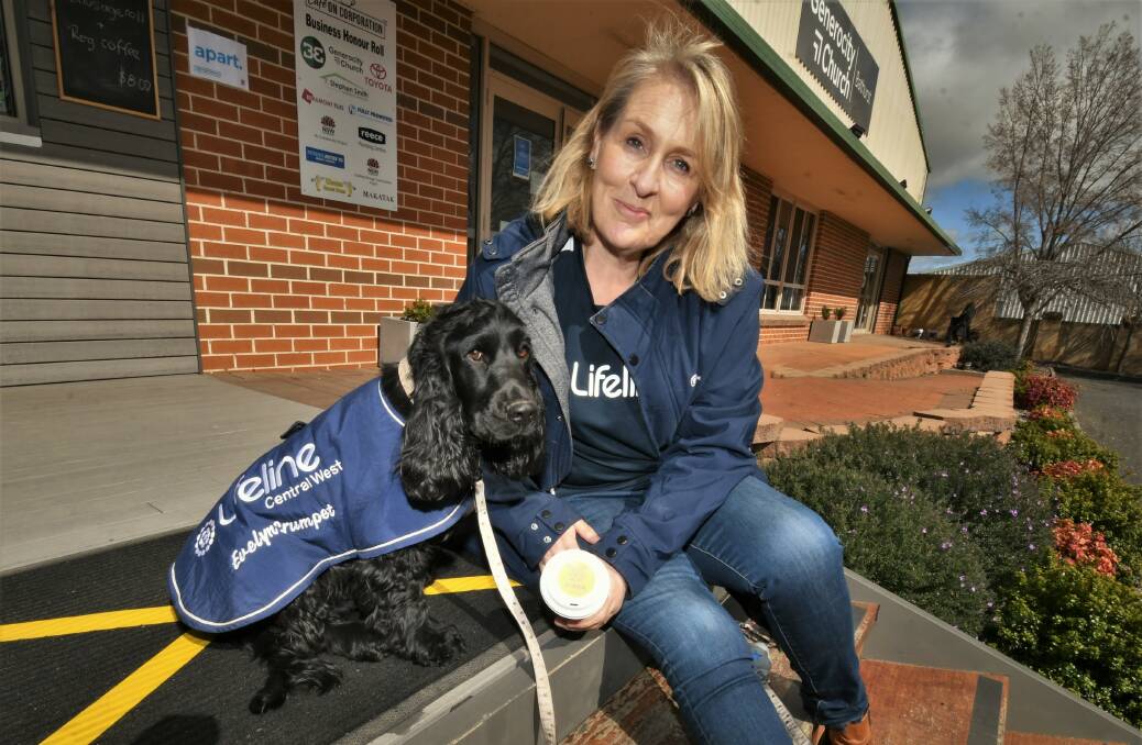 RAISING AWARENESS: Lifeline Central West CEO Stephanie Robinson with dog, raising awareness about suicide. Photo: CHRIS SEABROOK 090621cuppa1