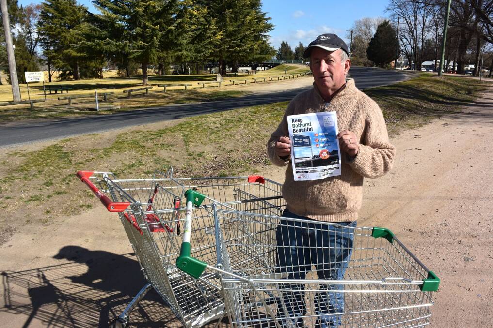 TIME TO ACT: Deputy mayor Bobby Bourke wants people to "Return, Report and Reduce" when it comes to trolleys. Photo: RACHEL CHAMBERLAIN 072618rctrol2