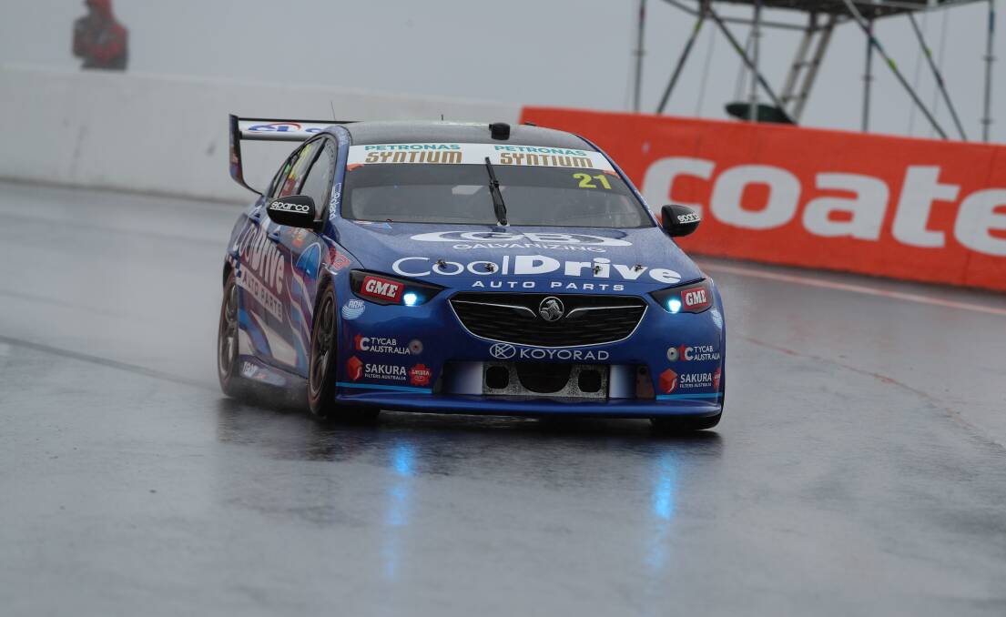 TOUGH CONDITIONS: Drivers were stuck on a wet track on Thursday. Photo: PHIL BLATCH