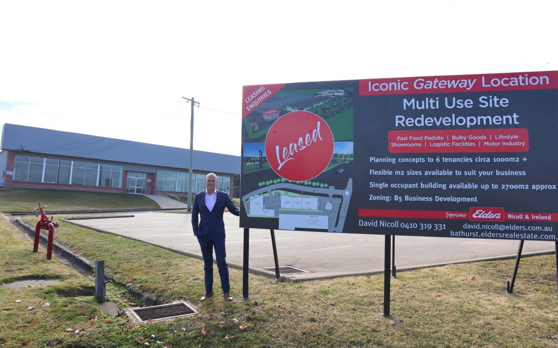 IT'S LEASED: Real estate agent David Nicoll outside the old Harvey Norman site, which will soon have a new tenant. Photo: SUPPLIED