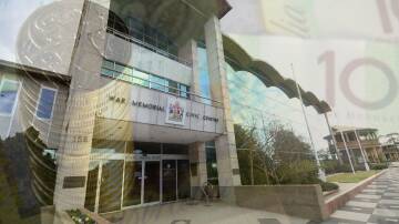 The Bathurst civic centre with an image of money overlaid. Picture file