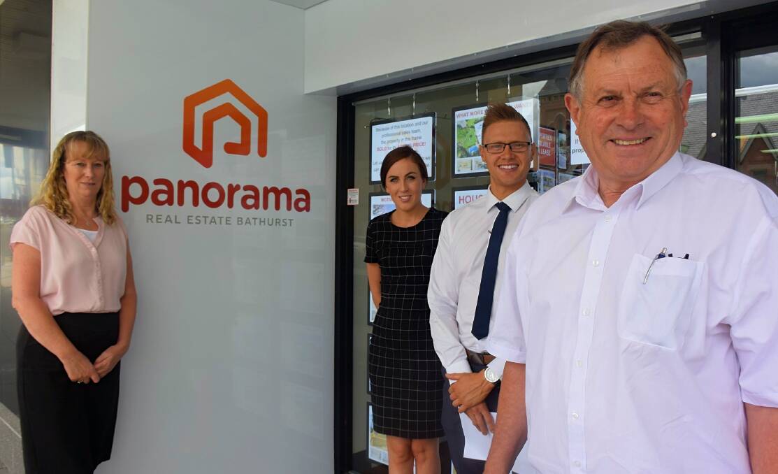 BRAND NEW: Peter Rogers with some of the staff members, Trish Goulding, Sarah Malcolm and Arron Bennett, at Panorama Real Estate, which has just re-branded from LJ Hooker Bathurst. Photo: RACHEL CHAMBERLAIN 122917rcpan