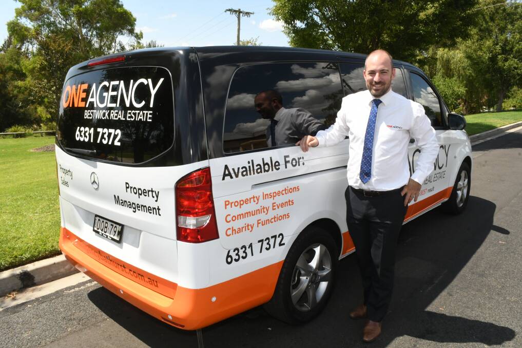 FOR HIRE: One Agency Bestwick Real Estate owner Mitchell Bestwick with the new vehicle that is available. Photo: CHRIS SEABROOK 030519climmo