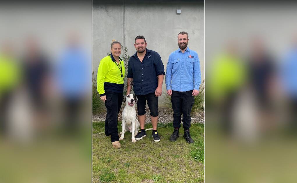 Daniel Child with his new dog Hopper (formerly known as Brax), and BARC staff members Alicia Blythe (left) and Zach Hanman (right). Picture supplied