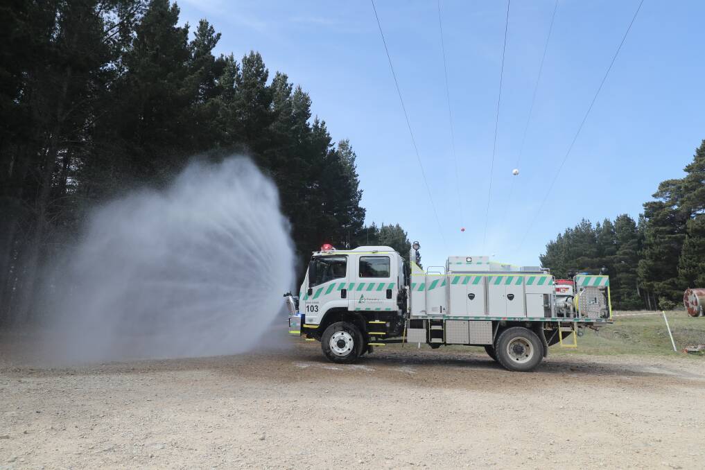 A new category one tanker spraying water at the Forestry Corporation's Sunny Corner depot. Picture by Phil Blatch