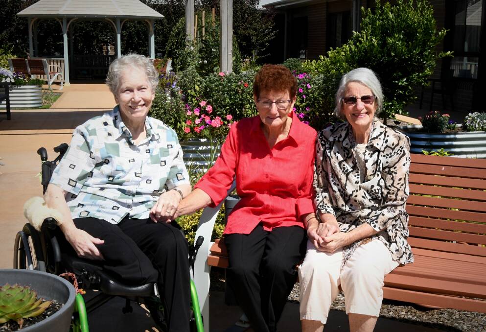 BELOVED: Joan Sweetnam (centre) with residents of St Catherine's, Sister Sheila Conliffe and Carmel Melton. Photo: RACHEL CHAMBERLAIN 012121rcjoan