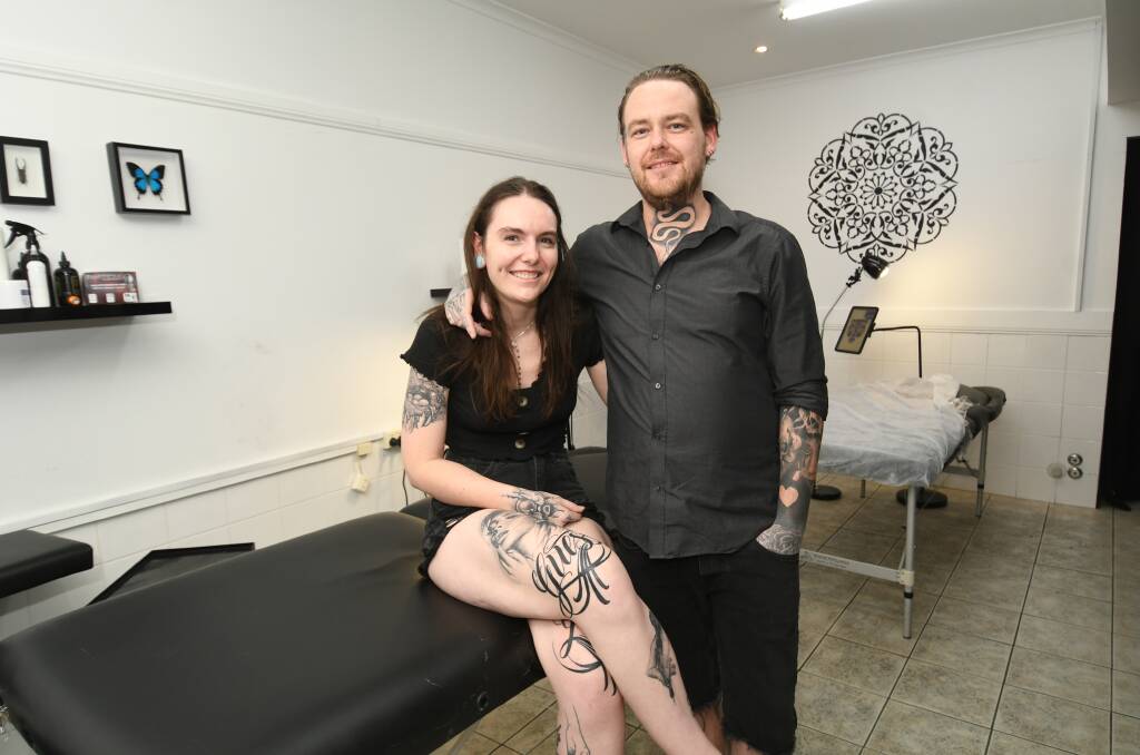 MOVING UP: Isabella Morawetz with Myles Josh of Unify Private Studio. The duo are set to move into a bigger premises. Photo: CHRIS SEABROOK 122119ctatoos1