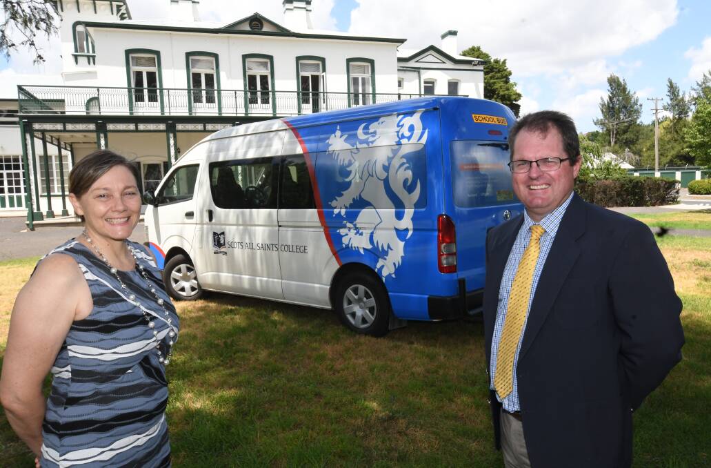 NEW LOOK: Head of the Scots campus, Tracey Leaf, with Chris Jackman, who is the head of the All Saints campus, showing off the new branding for Scots All Saints College. Photo: CHRIS SEABROOK 010919cnewbrand