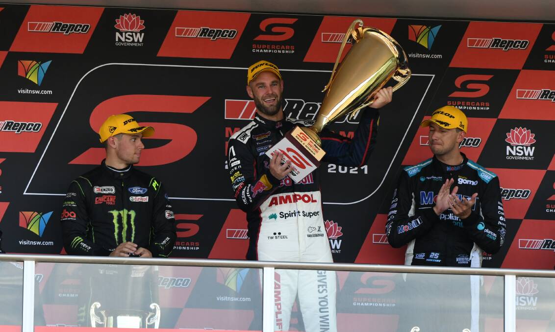 BACK-TO-BACK: Shane van Gisbergen, with the Sunday winners trophy, on the podium alongside Cameron Waters and Chaz Mostert. Photo: CHRIS SEABROOK 022821cwinrs1