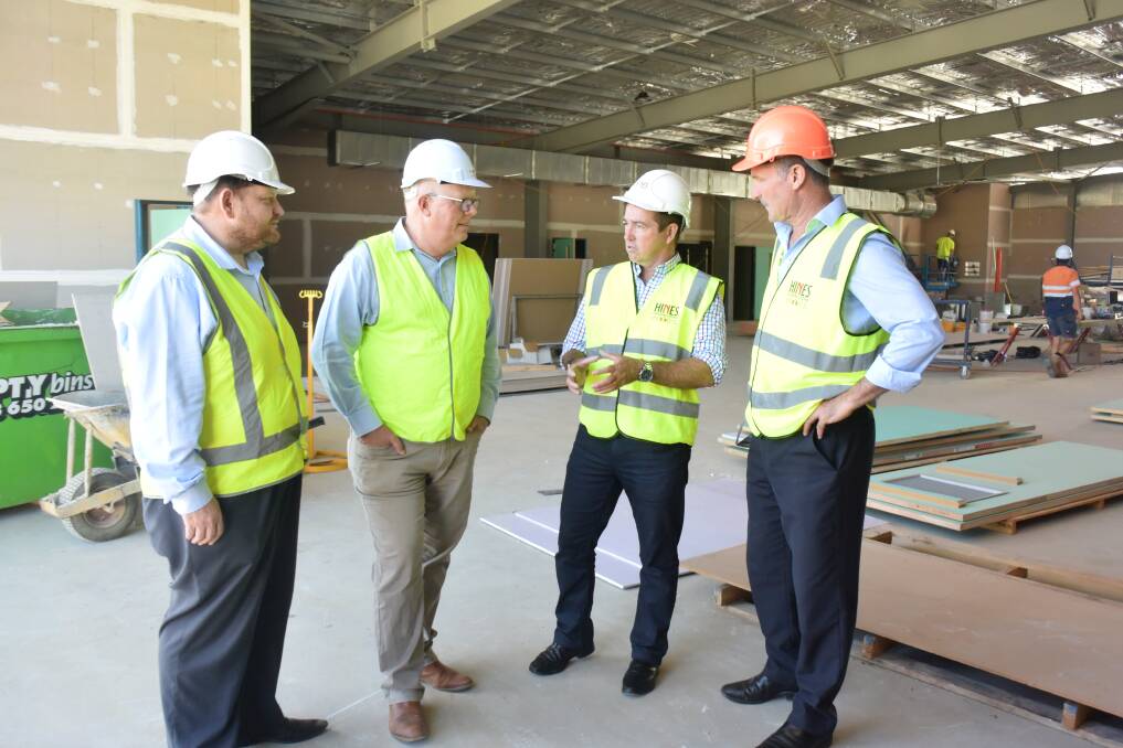 NEARLY DONE: Project manager Kevin Warman from Hines Constructions, Central West Project Management's Chris Milne, member for Bathurst Paul Toole and David Hines at the site. Photo: RACHEL CHAMBERLAIN 120718rcamb1