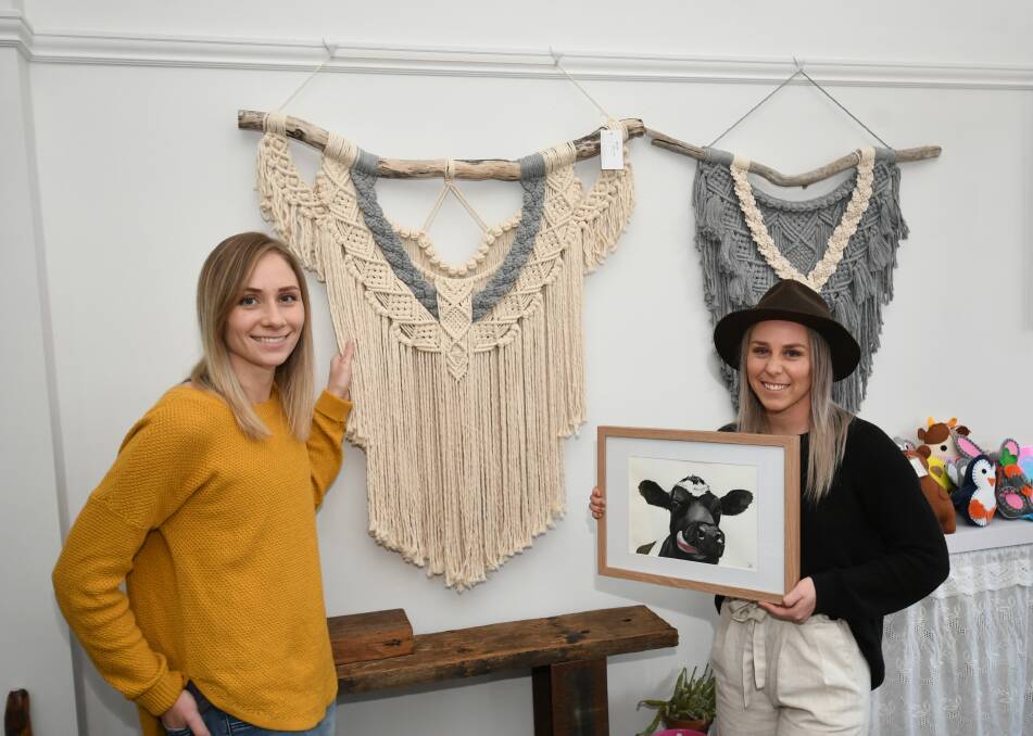 LOCAL TALENTS: Mandy Hotham and Jess Wheeler of M&J Designs, showing off some of their products. Photo:CHRIS SEABROOK 070820conline