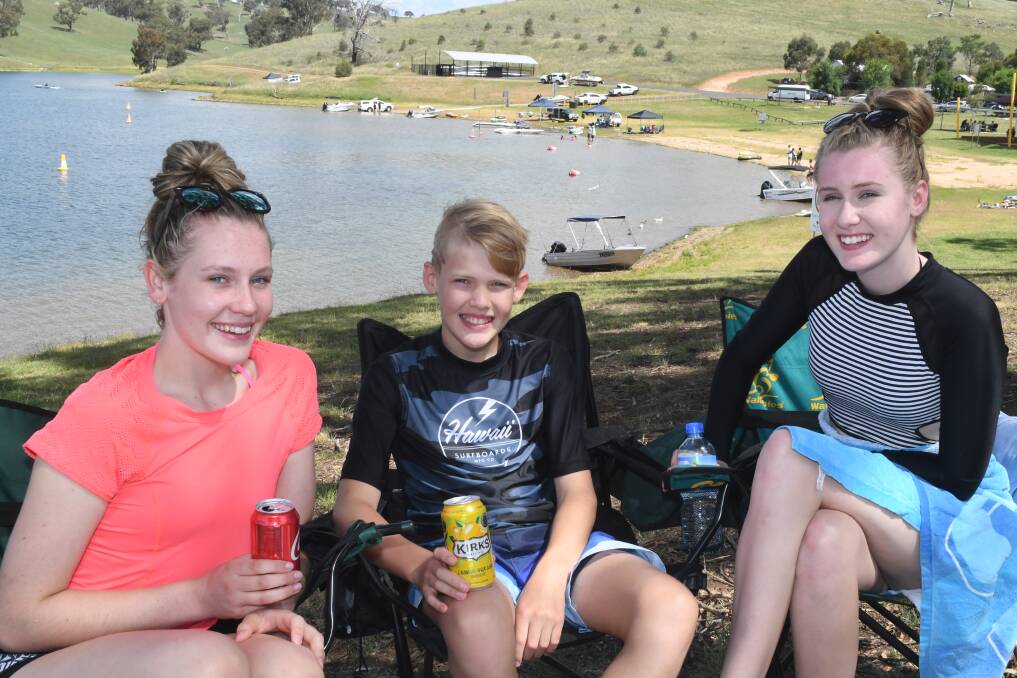 SUMMER FUN: Siblings Chloe, 14, James, 11, and Taylor Kennedy, 17, at Chifley Dam on Sunday afternoon. Photo: CHRIS SEABROOK 123117cdam1