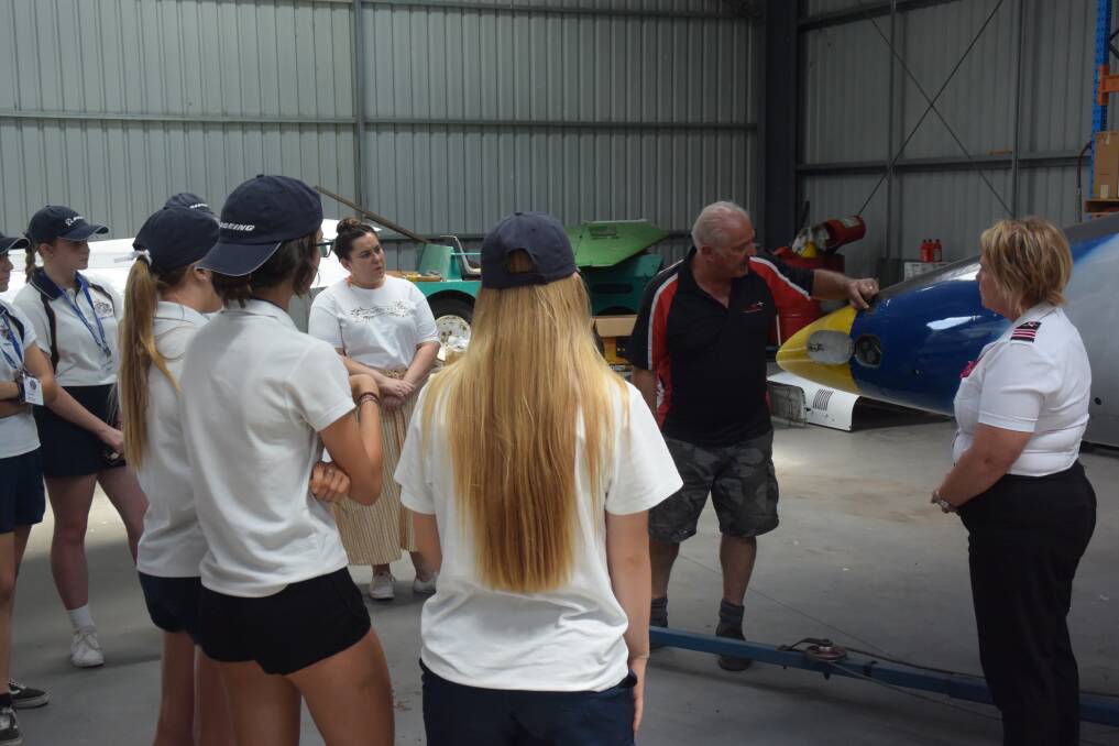 PHOTOS: Students take part in hangar tour. 