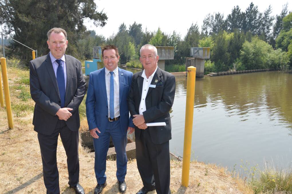 CASH SPLASH: Council's Engineering Services director Darren Sturgiss, Bathurst MP Paul Toole and mayor Bobby Bourke at the water filtration plant last November.