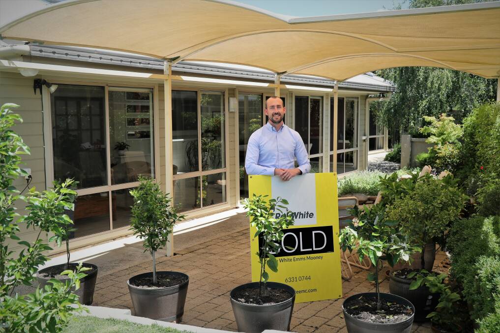 SUCCESSES: Ray White Emms Mooney real estate agent Jim Connors at one of the Bathurst homes that recently sold for over $1 million. Photo: PHIL BLATCH 110921pbmillion2